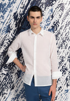 look homme chemise coton blanche transparente pantalon bleu